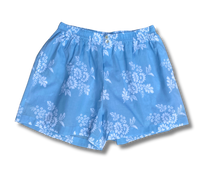 Load image into Gallery viewer, Blue boxer shorts with white floral pattern on a white background