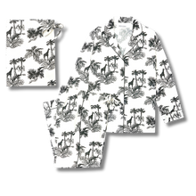 Load image into Gallery viewer, Set of pajama top and shorts with black jungle pattern on white background