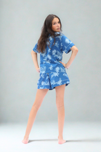Load image into Gallery viewer, Woman wearing a blue floral pyjama set