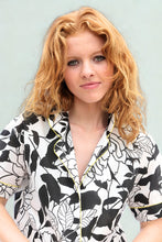 Load image into Gallery viewer, Woman wearing a black and white pyjama set
