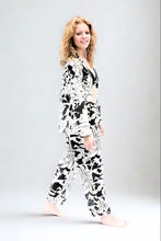 Load image into Gallery viewer, Woman wearing a black and white patterned pyjama

