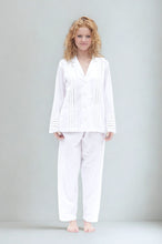 Load image into Gallery viewer, Woman wearing a white long sleeve pyjama set 
