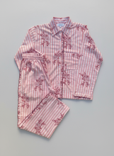 Load image into Gallery viewer, Pink striped Victoria pyjama set with striped and  floral patterns on a gray background
