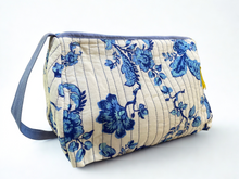 Load image into Gallery viewer, loral patterned bag with blue flowers on a white background
