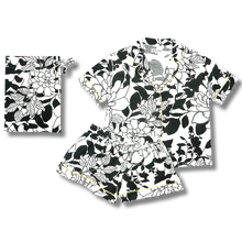 Load image into Gallery viewer, Set of t-shirt and shorts with black floral pattern on a white background
